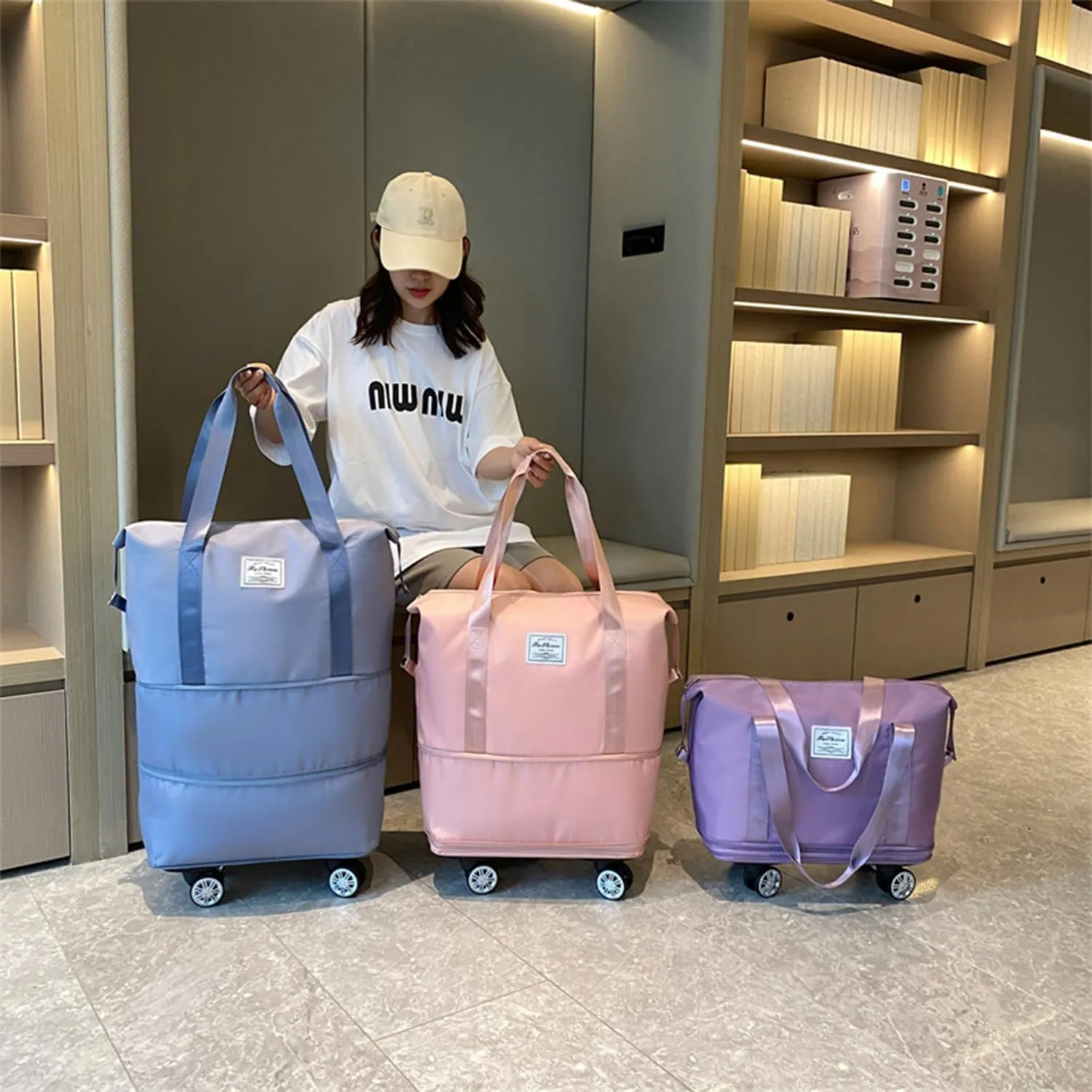 Pepepo Travel Bag with Wheels,2025 new large capacity travel bag - universal wheel removable,travel wheels,Expandable Foldable Duffle,Dry and Wet Separation (Pink)